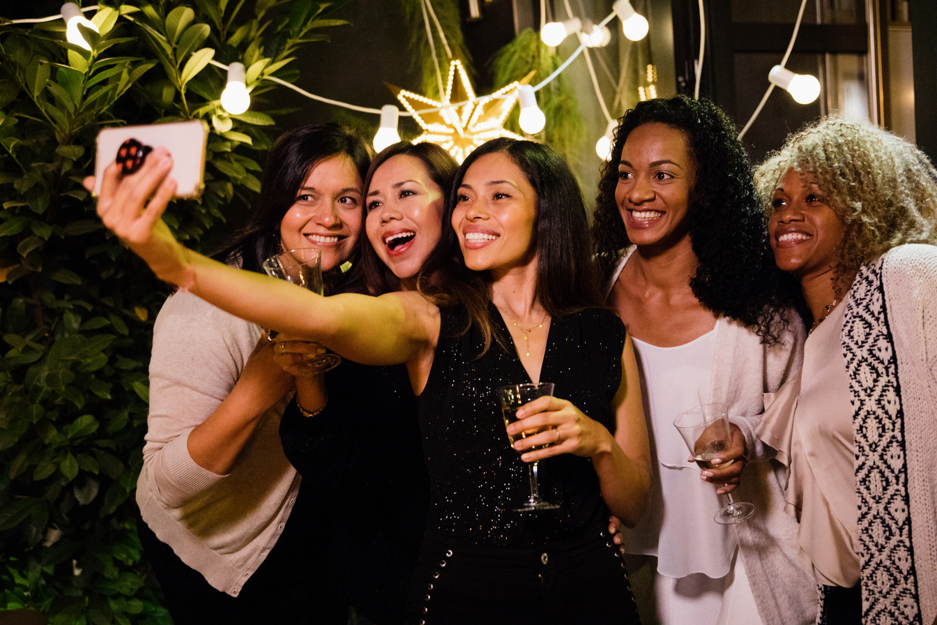 Latino women celebrating